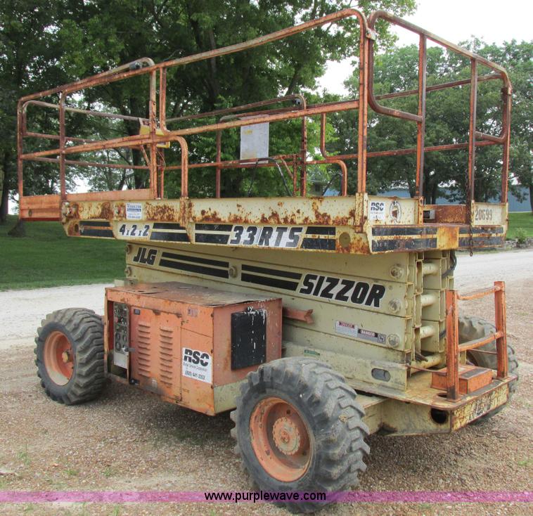 image for item I8950 1996 JLG 33RTS scissor lift