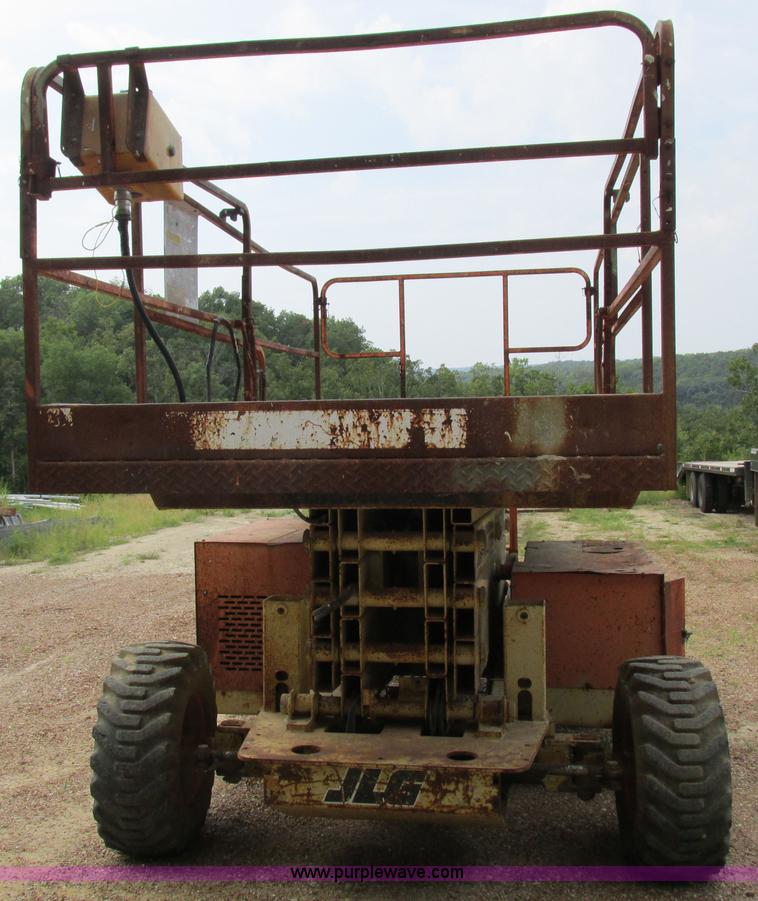 image for item I8950 1996 JLG 33RTS scissor lift