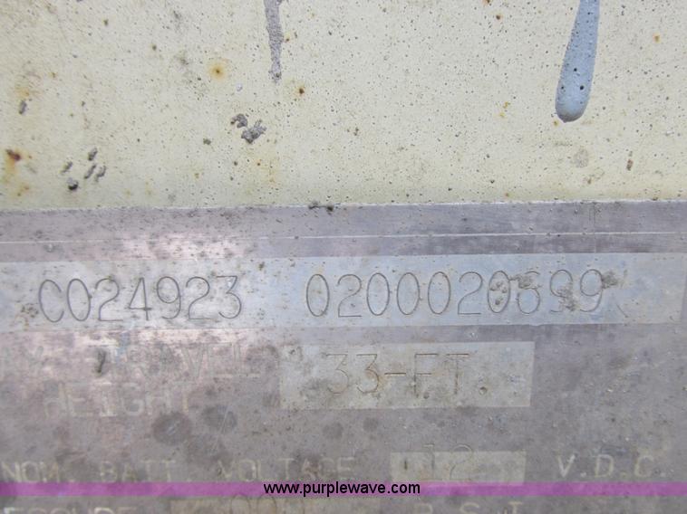 image for item I8950 1996 JLG 33RTS scissor lift