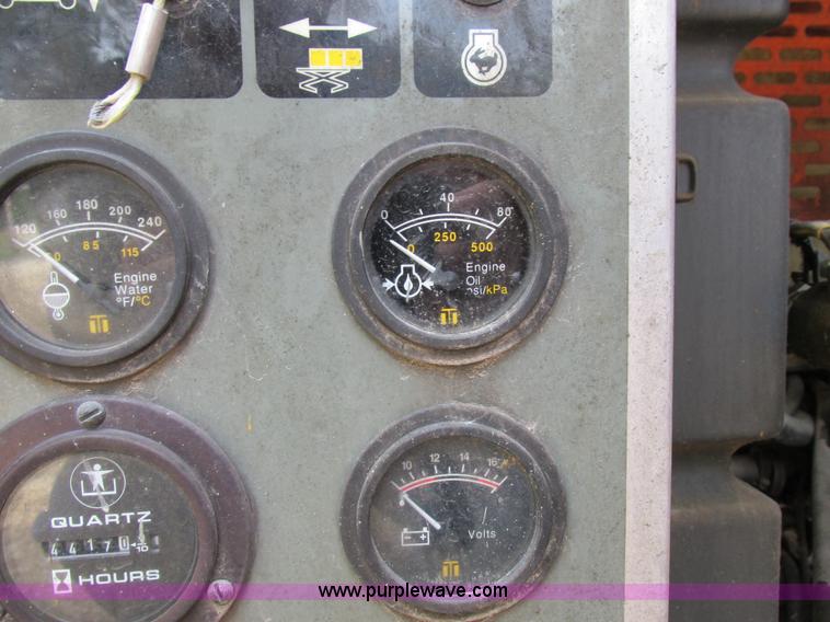 image for item I8950 1996 JLG 33RTS scissor lift