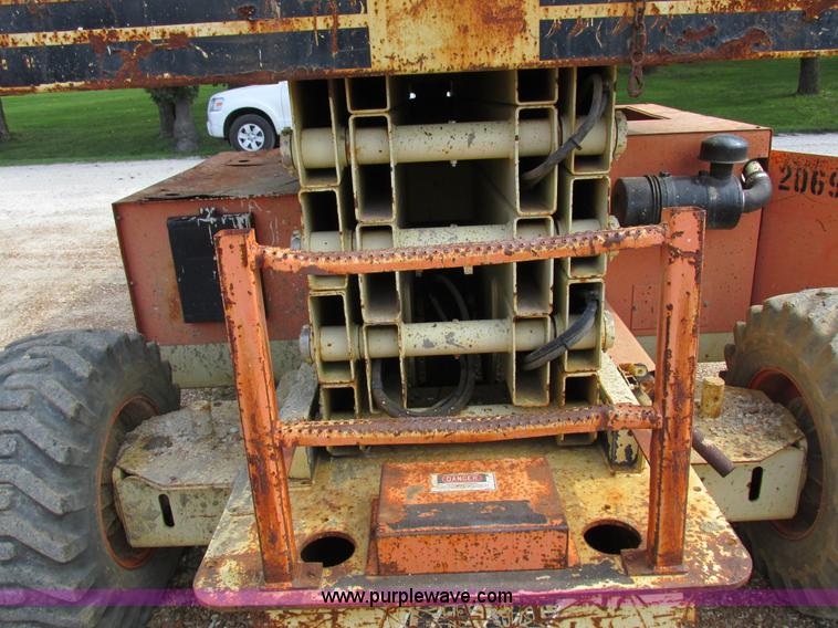 image for item I8950 1996 JLG 33RTS scissor lift