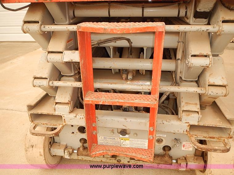 image for item J3105 1999 Skyjack III 4626 scissor lift