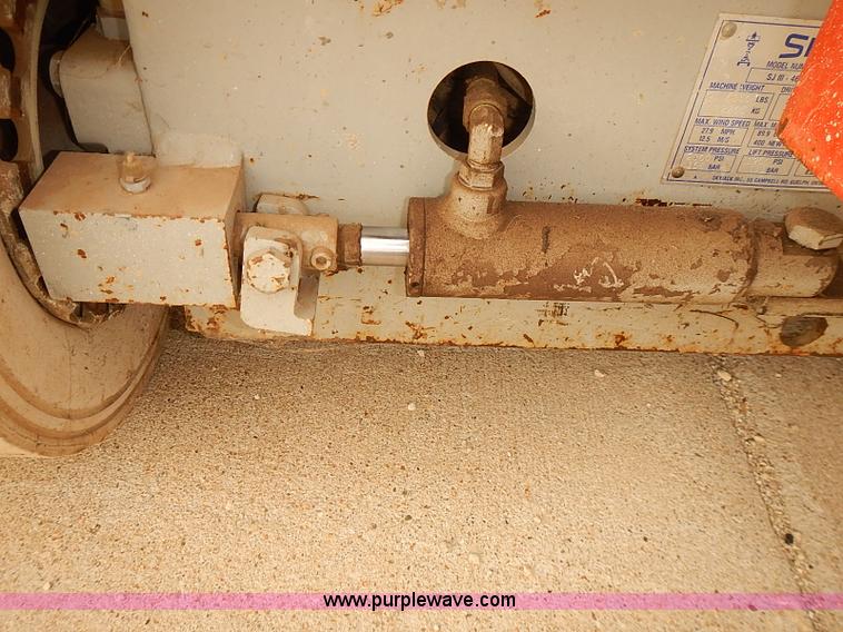 image for item J3105 1999 Skyjack III 4626 scissor lift