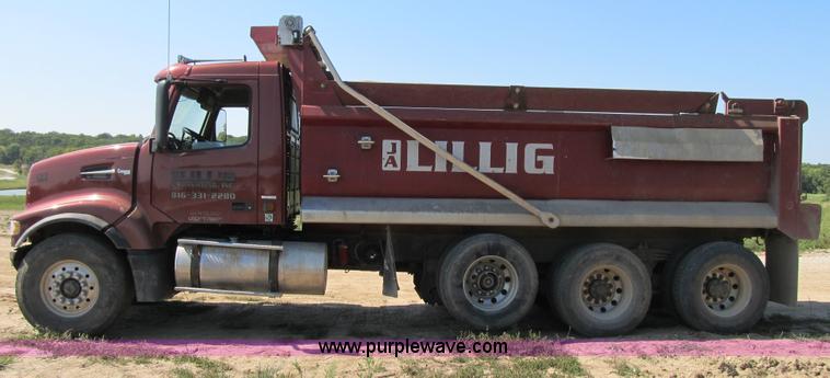 image for item Z9128 2002 Volvo VHD64F triple axle dump truck