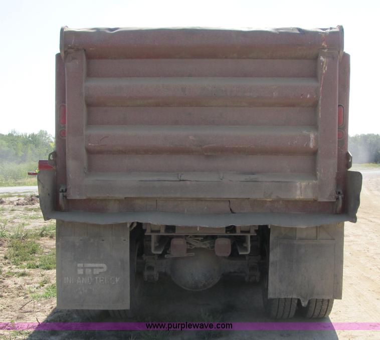 image for item Z9128 2002 Volvo VHD64F triple axle dump truck
