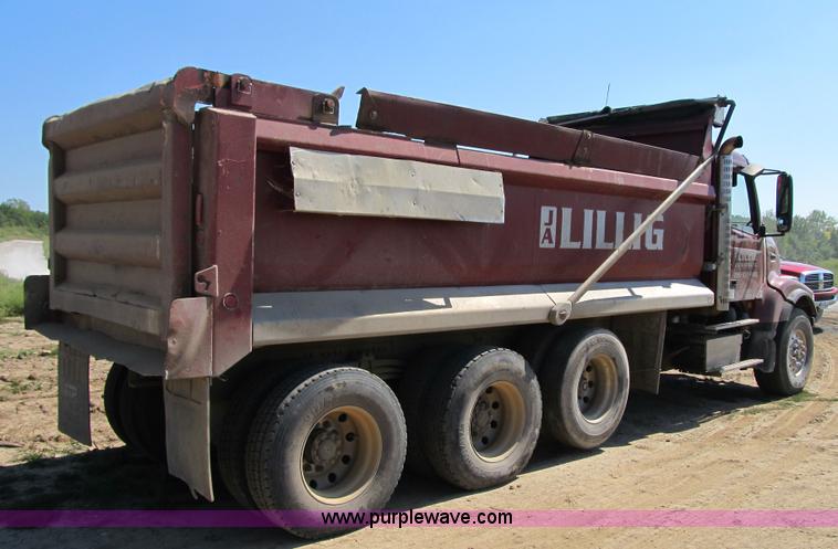 image for item Z9128 2002 Volvo VHD64F triple axle dump truck