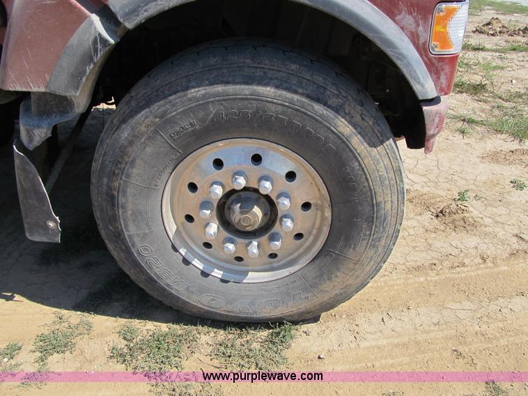 image for item Z9128 2002 Volvo VHD64F triple axle dump truck