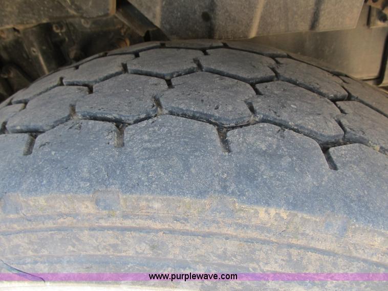 image for item Z9128 2002 Volvo VHD64F triple axle dump truck