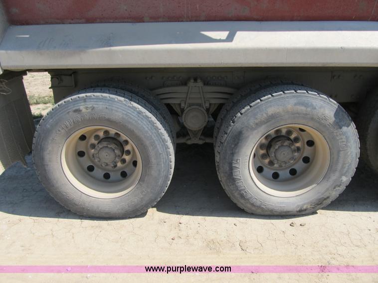image for item Z9128 2002 Volvo VHD64F triple axle dump truck