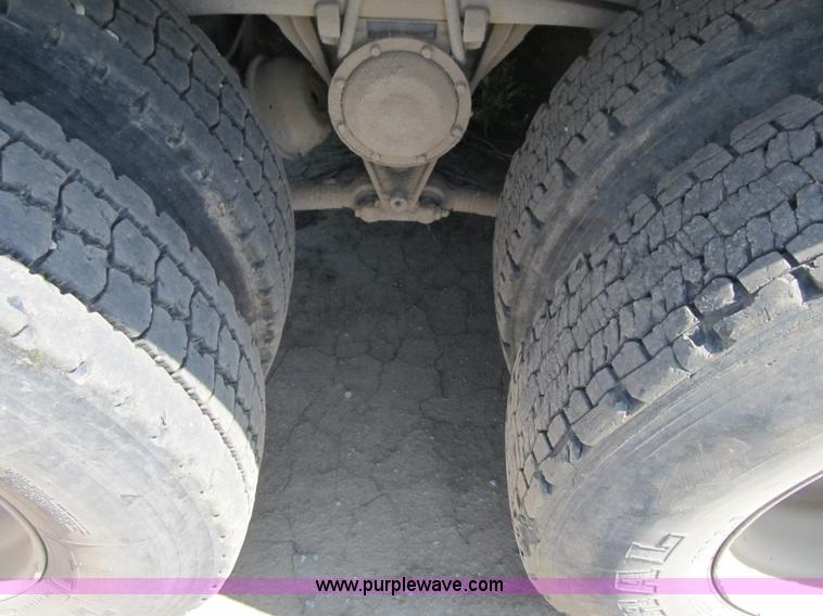 image for item Z9128 2002 Volvo VHD64F triple axle dump truck