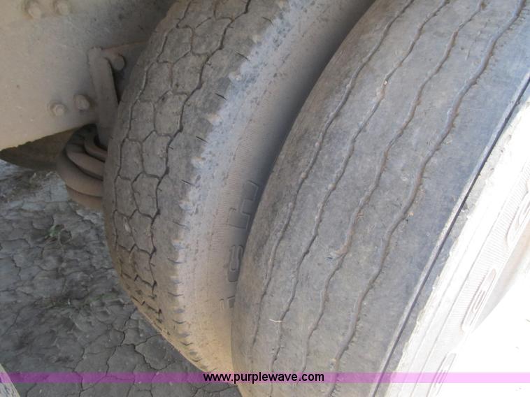 image for item Z9128 2002 Volvo VHD64F triple axle dump truck