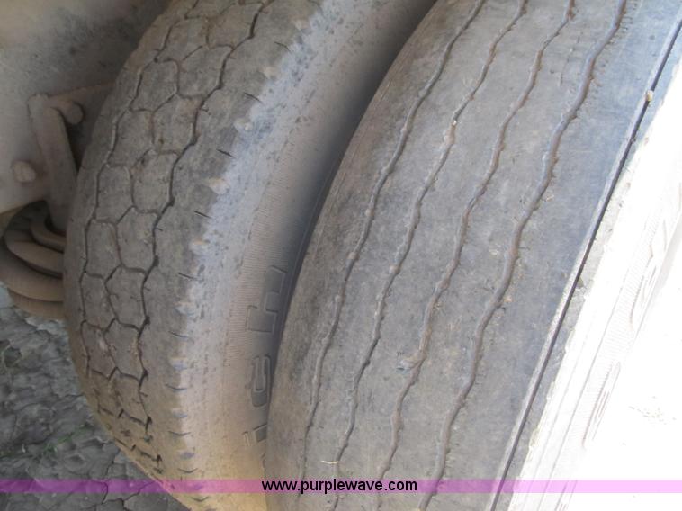 image for item Z9128 2002 Volvo VHD64F triple axle dump truck