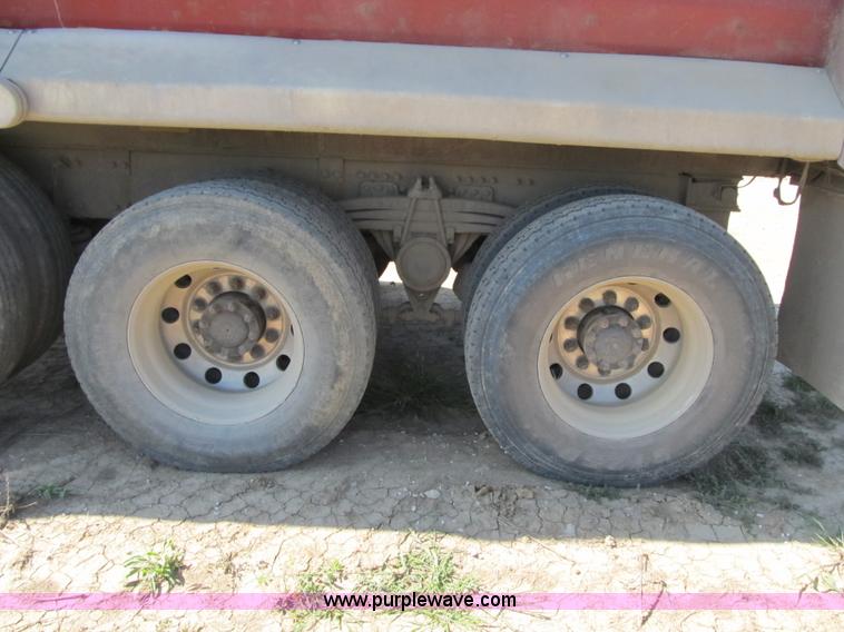 image for item Z9128 2002 Volvo VHD64F triple axle dump truck
