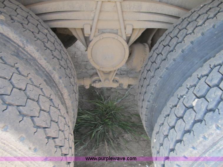 image for item Z9128 2002 Volvo VHD64F triple axle dump truck