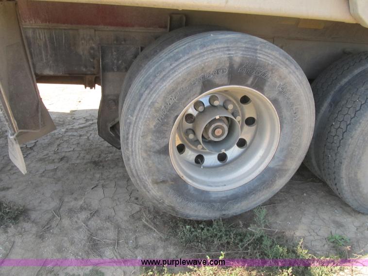 image for item Z9128 2002 Volvo VHD64F triple axle dump truck