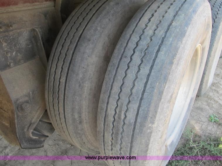 image for item Z9128 2002 Volvo VHD64F triple axle dump truck