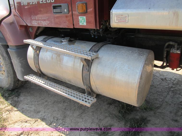 image for item Z9128 2002 Volvo VHD64F triple axle dump truck