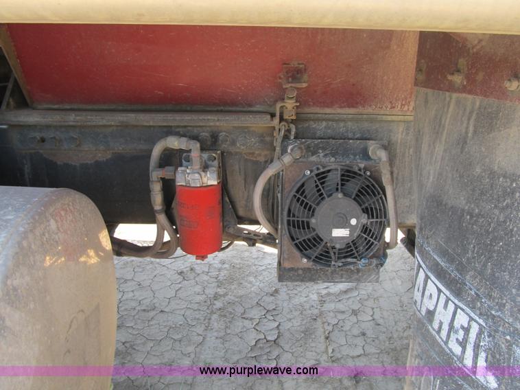 image for item Z9128 2002 Volvo VHD64F triple axle dump truck