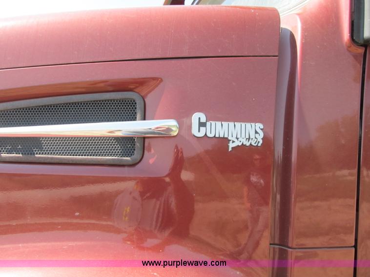 image for item Z9128 2002 Volvo VHD64F triple axle dump truck