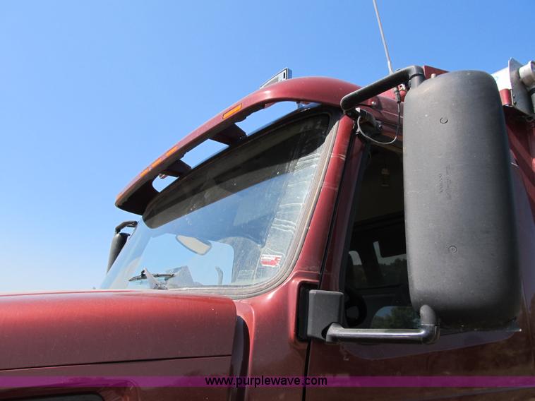 image for item Z9128 2002 Volvo VHD64F triple axle dump truck