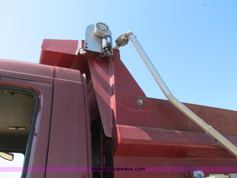image for item Z9128 2002 Volvo VHD64F triple axle dump truck