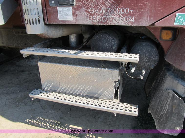 image for item Z9128 2002 Volvo VHD64F triple axle dump truck