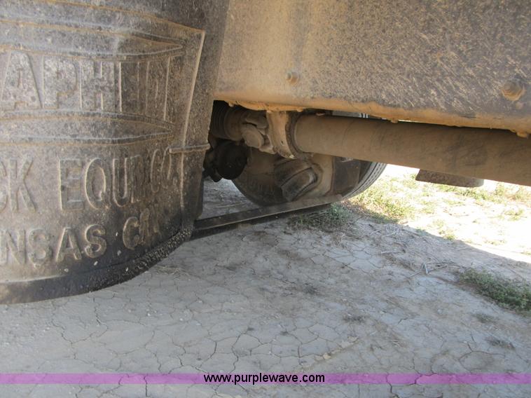 image for item Z9128 2002 Volvo VHD64F triple axle dump truck
