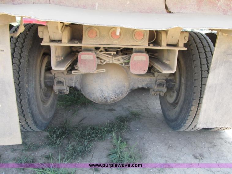 image for item Z9128 2002 Volvo VHD64F triple axle dump truck
