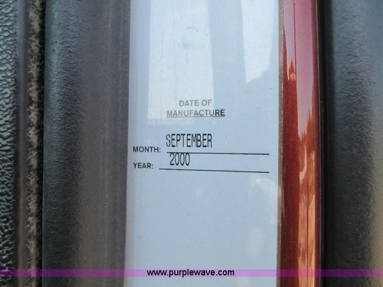 image for item Z9128 2002 Volvo VHD64F triple axle dump truck