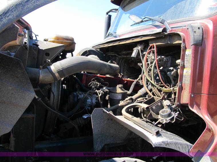 image for item Z9128 2002 Volvo VHD64F triple axle dump truck