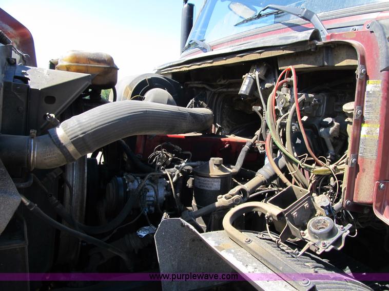 image for item Z9128 2002 Volvo VHD64F triple axle dump truck