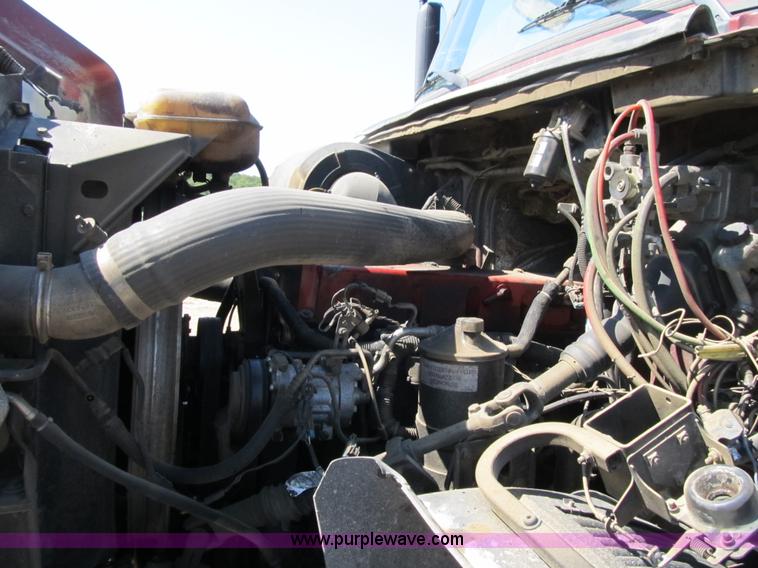 image for item Z9128 2002 Volvo VHD64F triple axle dump truck