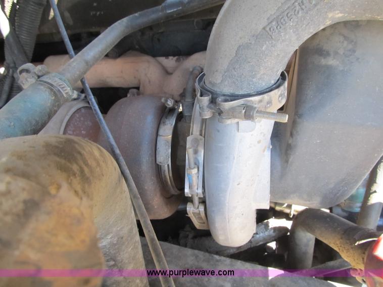 image for item Z9128 2002 Volvo VHD64F triple axle dump truck