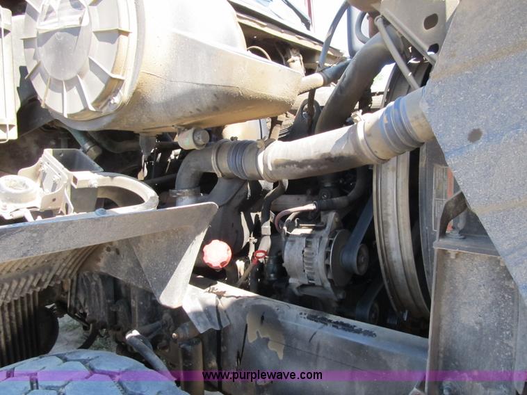 image for item Z9128 2002 Volvo VHD64F triple axle dump truck