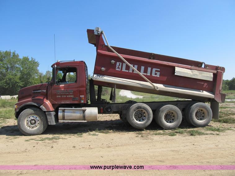 image for item Z9128 2002 Volvo VHD64F triple axle dump truck