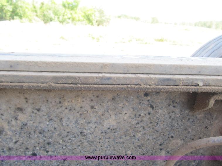 image for item Z9128 2002 Volvo VHD64F triple axle dump truck