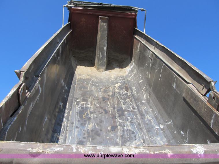 image for item Z9128 2002 Volvo VHD64F triple axle dump truck