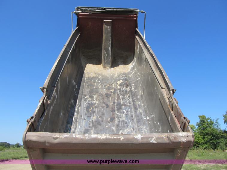 image for item Z9128 2002 Volvo VHD64F triple axle dump truck