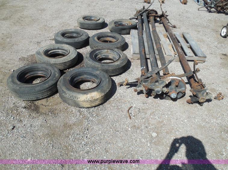 Assorted trailer axles and steel wheel and tires in Wichita, KS Item