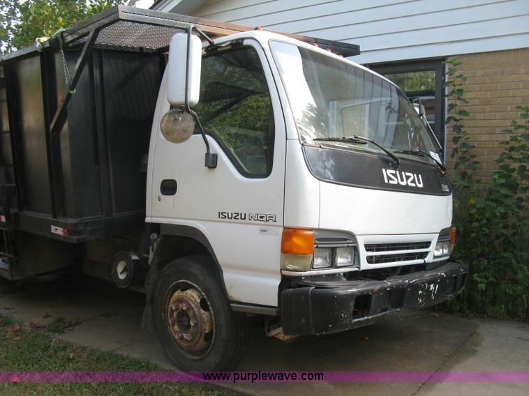 image for item E7965 2001 Isuzu NQR flatbed dump truck
