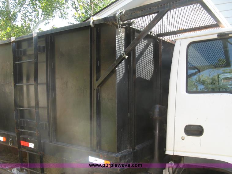 image for item E7965 2001 Isuzu NQR flatbed dump truck