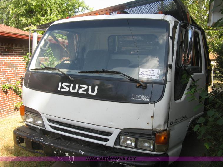 image for item E7965 2001 Isuzu NQR flatbed dump truck
