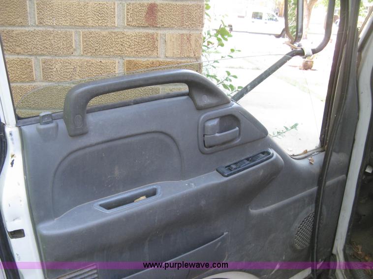 image for item E7965 2001 Isuzu NQR flatbed dump truck