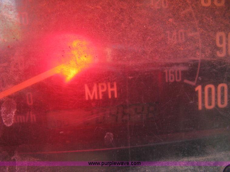 image for item E7965 2001 Isuzu NQR flatbed dump truck