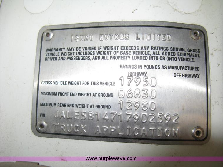 image for item E7965 2001 Isuzu NQR flatbed dump truck