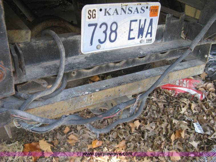 image for item E7965 2001 Isuzu NQR flatbed dump truck