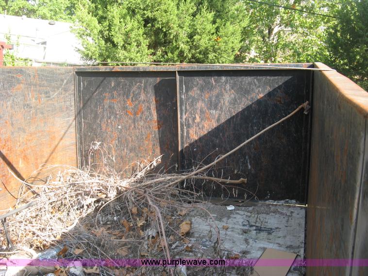 image for item E7965 2001 Isuzu NQR flatbed dump truck