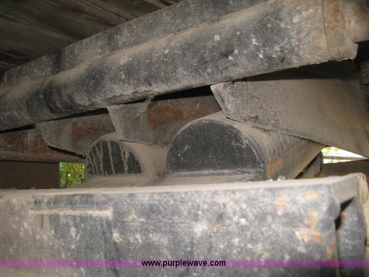 image for item E7965 2001 Isuzu NQR flatbed dump truck