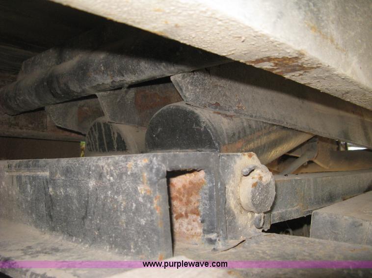 image for item E7965 2001 Isuzu NQR flatbed dump truck