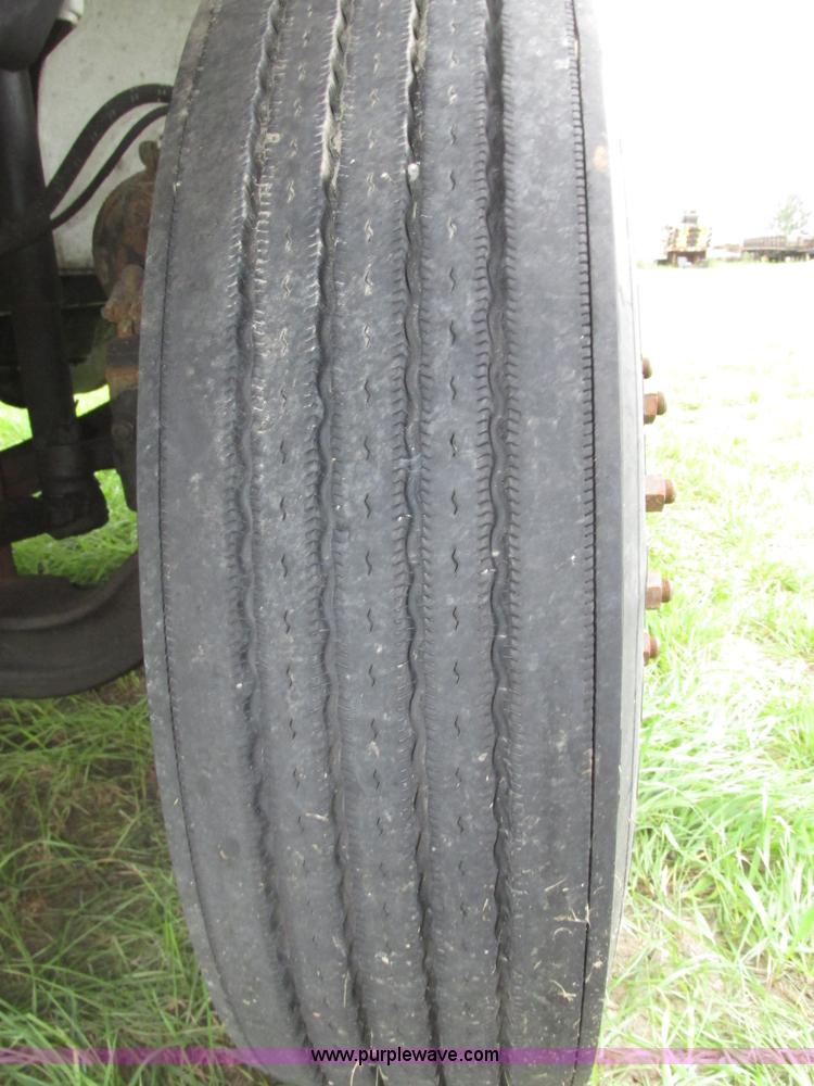 image for item G9938 2001 Freightliner FL70 Business Class truck cab and chassis